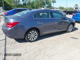 2015 Buick LaCrosse with VIN 1G4GA5GR4FF188164, listed as a IAAI auction lot 42056111 with 73,639 mi miles and . Bid and sale history available at DreamBid. Image 4.