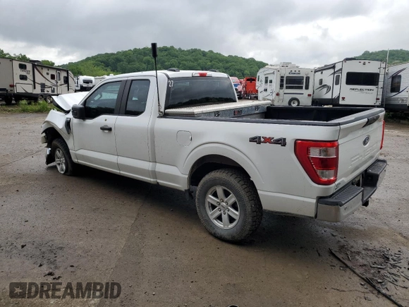 2021 Ford F-150 XL with VIN 1FTFX1E51MFC05216, listed as a Copart auction lot 56571785 with 94,584 mi miles and Salvage title. Bid and sale history available at DreamBid. Image 2.