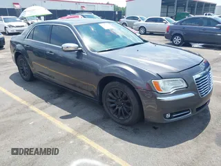 2013 Chrysler 300 with VIN 2C3CCAAG0DH703643, listed as a IAAI auction lot 42267365 with 184,590 mi miles and . Bid and sale history available at DreamBid. Image 1.