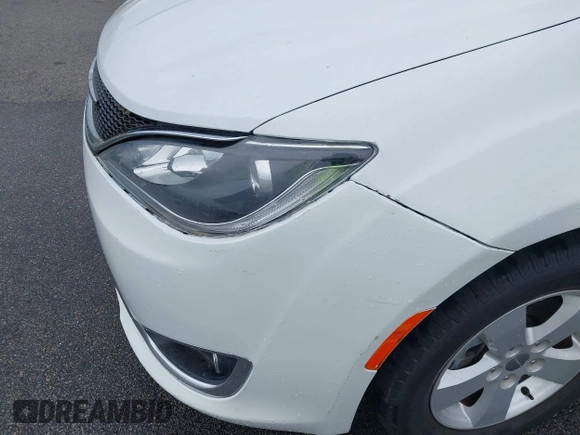 2020 Chrysler Pacifica Touring with VIN 2C4RC1FG4LR135808, listed as a IAAI auction lot 41932205 with 152,073 mi miles and . Bid and sale history available at DreamBid. Image 6.
