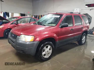 2004 Ford Escape XLS with VIN 1FMYU021X4DA05312, listed as a Copart auction lot 86185954 with 186,010 mi miles and Salvage Title. Bid and sale history available at DreamBid. Image 1.