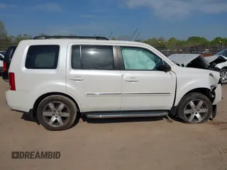 2013 Honda Pilot Touring with VIN 5FNYF3H92DB034731, listed as a IAAI auction lot 42049853 with 127,278 mi miles and . Bid and sale history available at DreamBid. Image 13.