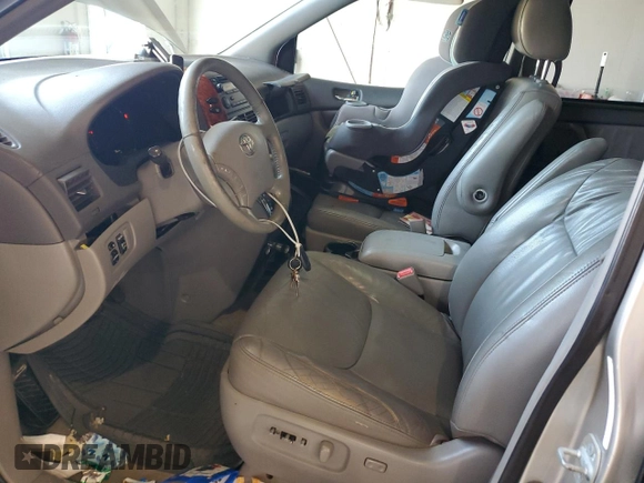 2010 Toyota Sienna XLE with VIN 5TDYK4CCXAS323450, listed as a Copart auction lot 62491545 with 220,121 mi miles and Salvage title. Bid and sale history available at DreamBid. Image 7.