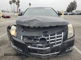 2013 Cadillac CTS Premium с VIN 1G6DP5E38D0107402, выставлен на аукционе Copart как лот 53307855 с пробегом 125 639 миль миль и Списание • Salvage title. История ставок и продаж доступна на DreamBid. Изображение 5.