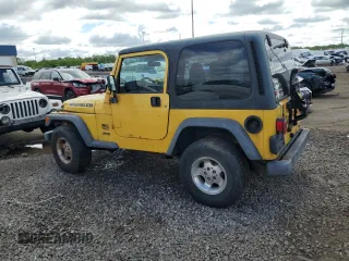2001 Jeep Wrangler Sport z VIN 1J4FA49S01P355451, wystawiony jako Copart lot #56501545 z przebiegiem 213 027 mil mil oraz Czysty tytuł • Clean title. Historia ofert i sprzedaży dostępna na DreamBid. Obrazek 2.