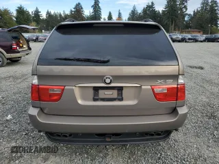 2006 BMW X5 4.4i with VIN 5UXFB53516LV27950, listed as a Copart auction lot 77837014 with 210,855 mi miles and Salvage Title. Bid and sale history available at carsss.com. Image 6.