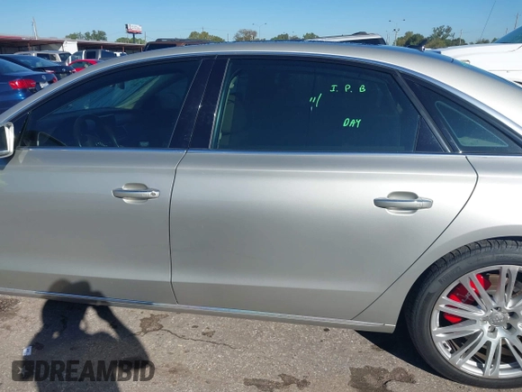 2015 Audi A8 3.0T with VIN WAU3GAFD5FN034341, listed as a IAAI auction lot 40892275 with 87,713 mi miles and . Bid and sale history available at DreamBid. Image 14.
