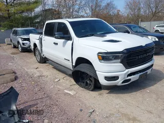 2023 Ram 1500 Laramie with VIN 1C6SRFJT8PN520610, listed as a IAAI auction lot 41898526 with 23,605 mi miles and . Bid and sale history available at DreamBid. Image 1.