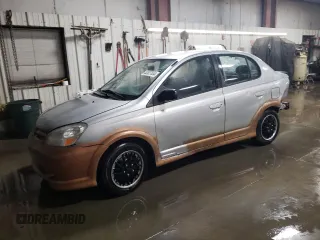2003 Toyota ECHO with VIN JTDBT123735040712, listed as a Copart auction lot 82827834 with 223,494 mi miles and Salvage Title. Bid and sale history available at carsss.com. Image 1.