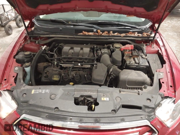 2013 Ford Taurus Limited with VIN 1FAHP2F82DG140741, listed as a IAAI auction lot 41882262 with 131,017 mi miles. Bid and sale history available at carsss.com. Image 10.