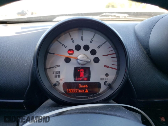 2011 MINI Countryman with VIN WMWZB3C53BWH95264, listed as a Copart auction lot 52238255 with 130,031 mi miles and Salvage Title. Bid and sale history available at DreamBid. Image 9.