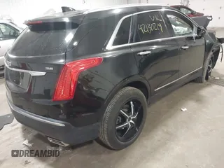 2018 Cadillac XT5 Premium Luxury FWD with VIN 1GYKNERS6JZ230175, listed as a IAAI auction lot 42130219 with 90,601 mi miles and . Bid and sale history available at DreamBid. Image 4.