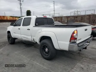 2014 Toyota Tacoma PreRunner with VIN 3TMKU4HN9EM040957, listed as a Copart auction lot 76579404 with 91,222 mi miles and Salvage title. Bid and sale history available at DreamBid. Image 2.