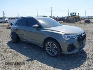 2022 Audi Q3 S line Premium Plus z VIN WA1EECF32N1040652, wystawiony jako IAAI lot #42140861 z przebiegiem 43 452 mil mil oraz . Historia ofert i sprzedaży dostępna na DreamBid. Obrazek 1.