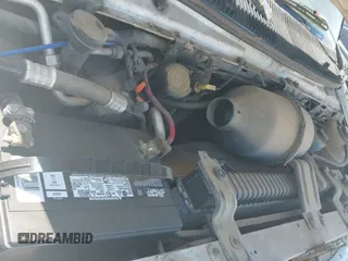 2000 Ford Econoline Cargo with VIN 1FTNS24L5YHB18588, listed as a IAAI auction lot 43120432 with 409,404 mi miles and . Bid and sale history available at DreamBid. Image 12.