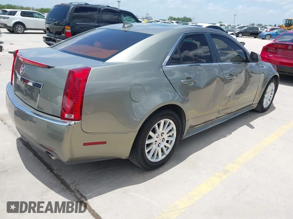 2010 Cadillac CTS Luxury with VIN 1G6DG5EG6A0148433, listed as a IAAI auction lot 42686517 with 106,701 mi miles and . Bid and sale history available at DreamBid. Image 4.