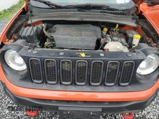2015 Jeep Renegade Trailhawk with VIN ZACCJBCT0FPB74261, listed as a Copart auction lot 56067395 with 182,703 mi miles and Clean Title. Bid and sale history available at carsss.com. Image 12.