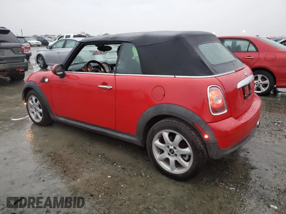 2009 MINI Convertible with VIN WMWMR33539TU96291, listed as a Copart auction lot 83849744 with 65,056 mi miles and Salvage title. Bid and sale history available at DreamBid. Image 2.