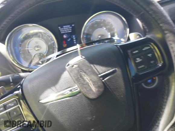 2012 Chrysler 300 S with VIN 2C3CCABG2CH155173, listed as a IAAI auction lot 41941875 with 191,313 mi miles and . Bid and sale history available at DreamBid. Image 11.