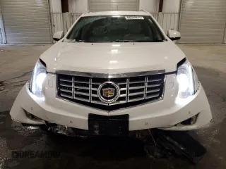 2014 Cadillac SRX Premium Collection z VIN 3GYFNGE36ES581361, wystawiony jako Copart lot #88540815 z przebiegiem 137 047 mil mil oraz Nie do naprawy. Historia ofert i sprzedaży dostępna na DreamBid. Obrazek 5.