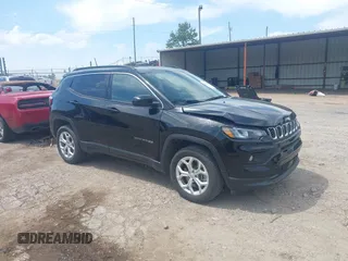 2024 Jeep Compass Latitude with VIN 3C4NJDBN4RT119513, listed as a IAAI auction lot 42153389 with 27,635 mi miles. Bid and sale history available at carsss.com. Image 1.