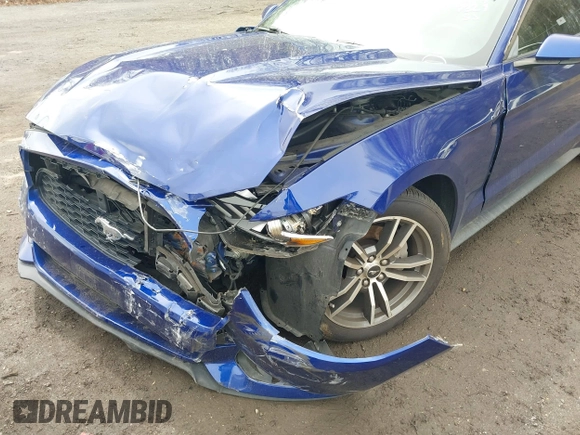 2015 Ford Mustang EcoBoost with VIN 1FA6P8TH9F5317329, listed as a IAAI auction lot 41966041 with 61,357 mi miles and . Bid and sale history available at carsss.com. Image 6.