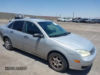 2007 Ford Focus S z VIN 1FAFP34N67W175198, wystawiony jako IAAI lot #42426040 z przebiegiem 137 383 mil mil oraz . Historia ofert i sprzedaży dostępna na DreamBid. Obrazek 1.