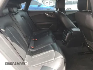 2013 Audi A7 Premium Plus с VIN WAUYGAFC0DN150198, выставлен на аукционе Copart как лот 57154595 с пробегом 144 056 миль миль и Списание • Salvage title. История ставок и продаж доступна на DreamBid. Изображение 10.