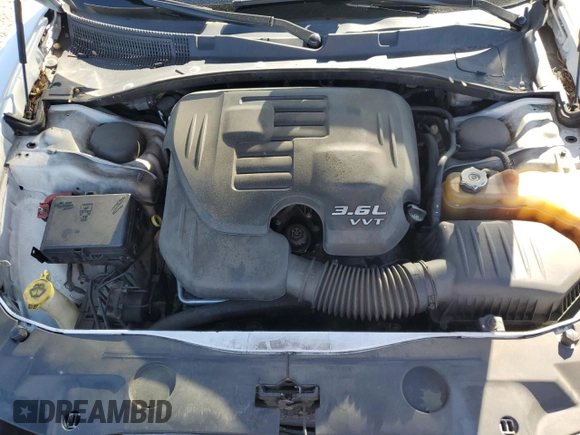 2014 Dodge Charger SE with VIN 2C3CDXBG9EH268119, listed as a Copart auction lot 55650705 with 185,024 mi miles and Salvage Title. Bid and sale history available at DreamBid. Image 11.