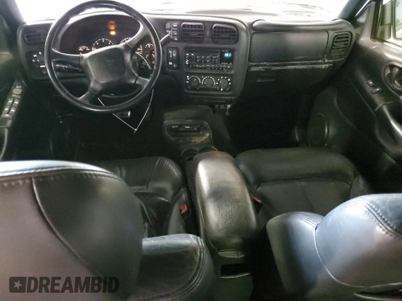 2000 Chevrolet Blazer LT z VIN 1GNDT13W1Y2282557, wystawiony jako Copart lot #55560775 z przebiegiem 219 795 mil mil oraz Szkoda całkowita • Salvage title. Historia ofert i sprzedaży dostępna na DreamBid. Obrazek 8.
