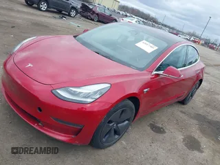 2018 Tesla Model 3 Long Range Battery with VIN 5YJ3E1EB3JF129772, listed as a IAAI auction lot 42017305 with 103,825 mi miles and . Bid and sale history available at DreamBid. Image 2.