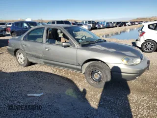 1998 Ford Contour z VIN 1FAFP66Z5WK232756, wystawiony jako Copart lot #86648364 z przebiegiem 118 176 mil mil oraz Tytuł czysty. Historia ofert i sprzedaży dostępna na DreamBid. Obrazek 4.