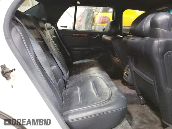 2001 Cadillac DeVille z VIN 1G6KD54Y31U294274, wystawiony jako Copart lot #46474844 z przebiegiem 147 396 mil mil oraz Nie do naprawy • Non repairable. Historia ofert i sprzedaży dostępna na DreamBid. Obrazek 10.