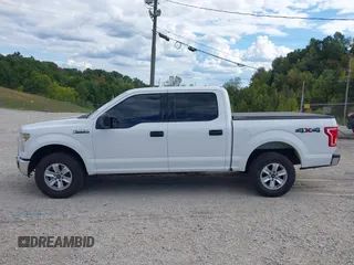 2015 Ford F-150 XLT with VIN 1FTEW1EF5FFB13987, listed as a IAAI auction lot 40377116 with 186,029 mi miles. Bid and sale history available at carsss.com. Image 14.