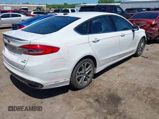 2017 Ford Fusion SE z VIN 3FA6P0H90HR246900, wystawiony jako IAAI lot #42169109 z przebiegiem 178 878 mil mil oraz . Historia ofert i sprzedaży dostępna na DreamBid. Obrazek 4.