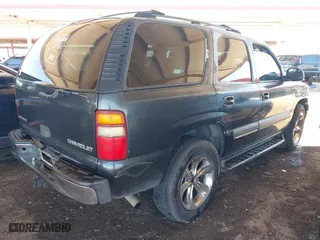 2003 Chevrolet Tahoe LT with VIN 1GNEC13Z03R286579, listed as a IAAI auction lot 41872493 with 236,001 mi miles. Bid and sale history available at carsss.com. Image 4.
