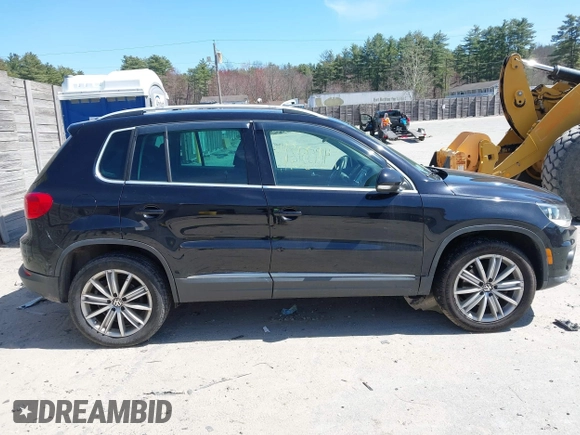 2012 Volkswagen Tiguan SEL with VIN WVGAV7AX2CW529232, listed as a IAAI auction lot 41955121 with 164,885 mi miles and . Bid and sale history available at DreamBid. Image 13.