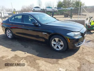 2012 BMW 5 Series 528i xDrive with VIN WBAXH5C52CC595140, listed as a IAAI auction lot 41780618 with 219,414 mi miles. Bid and sale history available at carsss.com. Image 1.