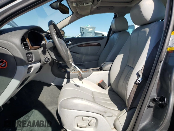 2003 Jaguar S-Type with VIN SAJEB01T83FM51480, listed as a Copart auction lot 43444065 with 83,840 mi miles and Salvage Title. Bid and sale history available at DreamBid. Image 7.