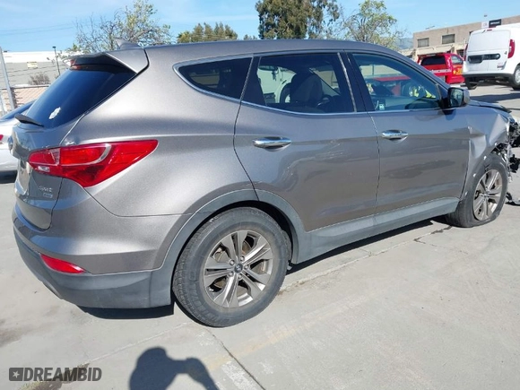 2015 Hyundai Santa Fe Sport with VIN 5XYZTDLB2FG294782, listed as a IAAI auction lot 41970007 with 144,531 mi miles. Bid and sale history available at carsss.com. Image 4.