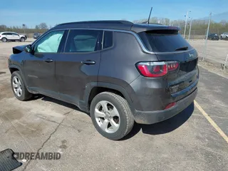 2018 Jeep Compass Altitude with VIN 3C4NJDBB6JT239565, listed as a IAAI auction lot 42219401 with 85,013 mi miles and . Bid and sale history available at DreamBid. Image 3.