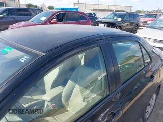 2010 Toyota Yaris with VIN JTDBT4K35A1365932, listed as a IAAI auction lot 42169944 with 248,292 mi miles and . Bid and sale history available at DreamBid. Image 12.