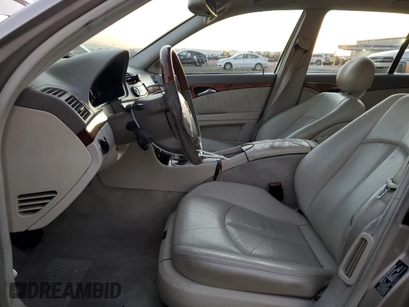 2004 Mercedes-Benz E 320 with VIN WDBUH65J94A380758, listed as a Copart auction lot 79520504 with 163,883 mi miles and Salvage Title. Bid and sale history available at DreamBid. Image 7.