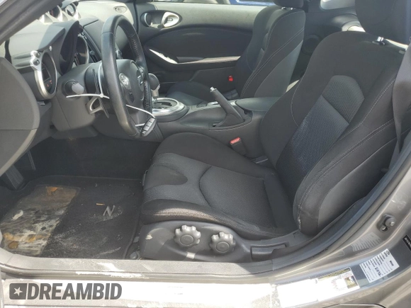 2014 Nissan 370Z with VIN JN1AZ4EH6EM633797, listed as a Copart auction lot 74027354 with Not Provided miles and Salvage Title. Bid and sale history available at DreamBid. Image 7.