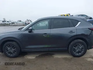 2021 Mazda CX-5 Touring with VIN JM3KFACM6M0480487, listed as a IAAI auction lot 41731646 with 26,951 mi miles and . Bid and sale history available at carsss.com. Image 15.