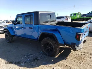 2022 Jeep Gladiator Willys with VIN 1C6JJTAM3NL132056, listed as a Copart auction lot 75723014 with 36,195 mi miles and Salvage title. Bid and sale history available at DreamBid. Image 2.