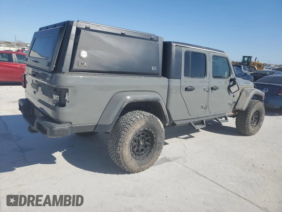 2022 Jeep Gladiator Texas Trail with VIN 1C6HJTAG8NL103449, listed as a Copart auction lot 49823595 with 60,902 mi miles and Salvage Title. Bid and sale history available at carsss.com. Image 3.