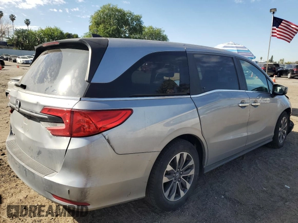 2021 Honda Odyssey EX-L with VIN 5FNRL6H77MB011099, listed as a Copart auction lot 47412535 with 148,004 mi miles and Salvage Title. Bid and sale history available at DreamBid. Image 3.