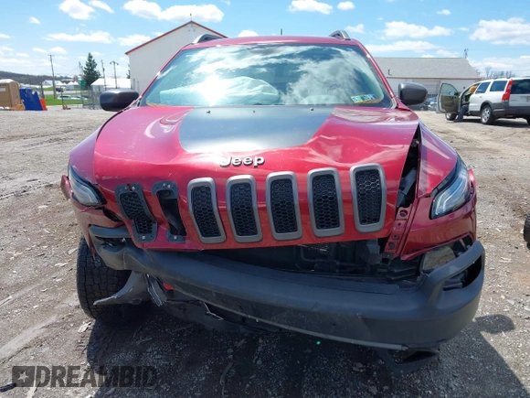 2015 Jeep Cherokee Trailhawk with VIN 1C4PJMBS0FW728361, listed as a IAAI auction lot 41978853 with 123,127 mi miles. Bid and sale history available at carsss.com. Image 12.