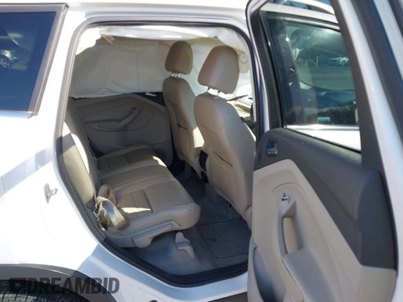 2014 Ford Escape Titanium with VIN 1FMCU9JX7EUD17335, listed as a IAAI auction lot 41302107 with 104,352 mi miles and . Bid and sale history available at DreamBid. Image 8.
